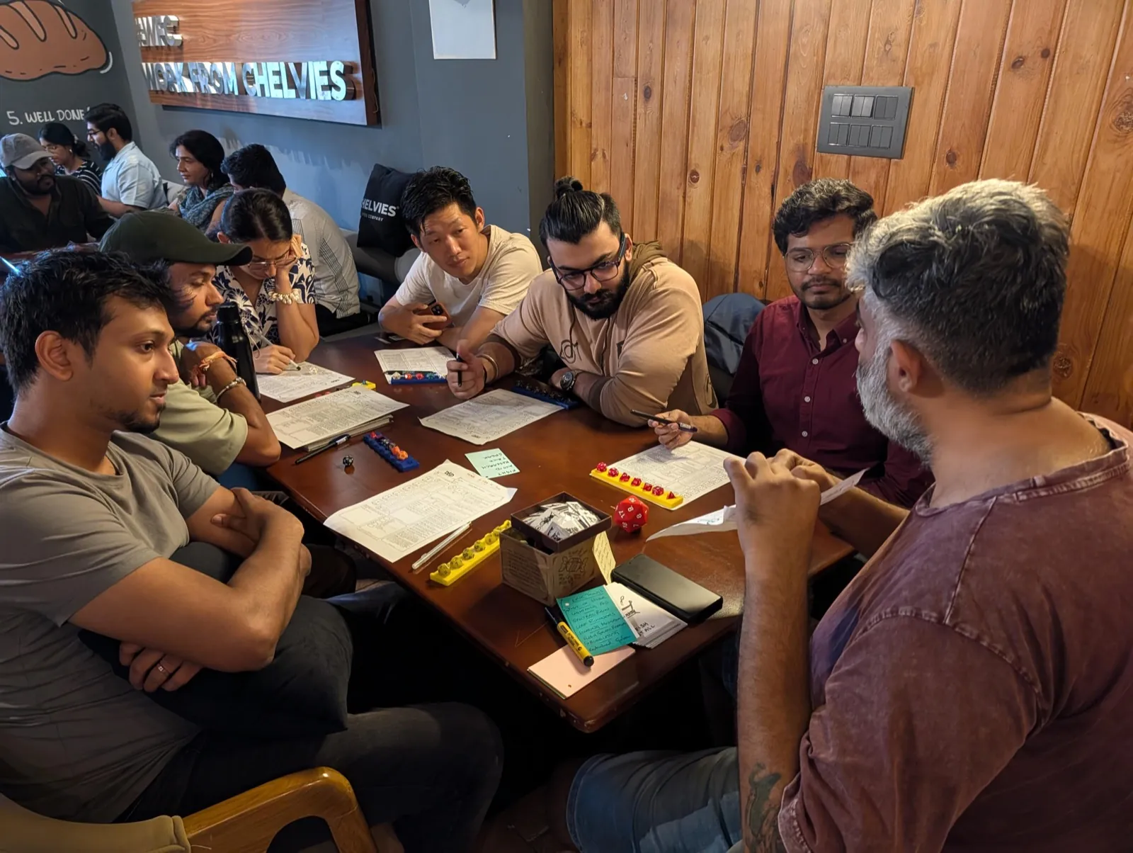 Colleagues playing a collaborative tabletop role-playing game