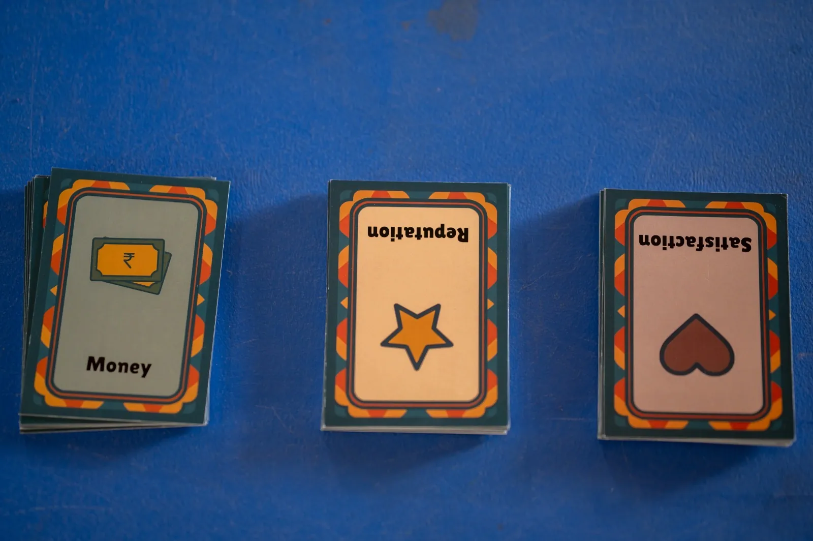 Serious-game resource cards laid out on a table
